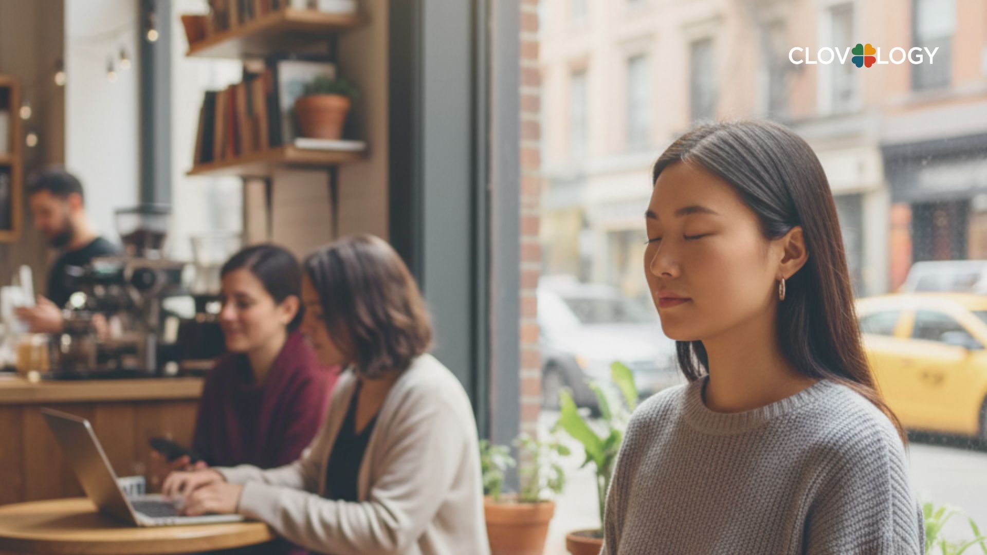 A woman is practicing mindfulness in a coffee shop, this is how she appreciates the present so she can get closer to happiness in every moment. A women are getting closer to happiness.